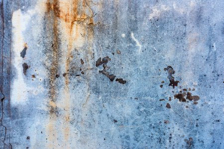 Photo for Texture of an old damaged concrete wall with cracks and stains as grunge background - Royalty Free Image