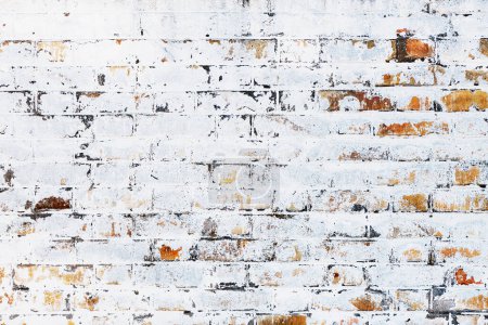 Photo for Old brick wall with white paint peeling off the surface, grunge texture and background - Royalty Free Image