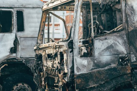 Photo for Semi truck engulfed by fire flames after traffic accident is burned and damaged, selective focus - Royalty Free Image