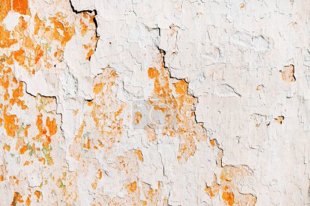 Photo for Old cracked weathered shabby white painted plastered peeled wall background and texture - Royalty Free Image