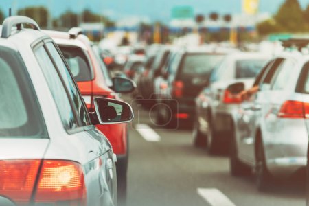 Photo for Large queue of vehicles on motorway pay toll in summer, selective focus - Royalty Free Image