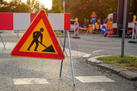Photo for Road work traffic sign, highway maintenance construction site, selective focus - Royalty Free Image