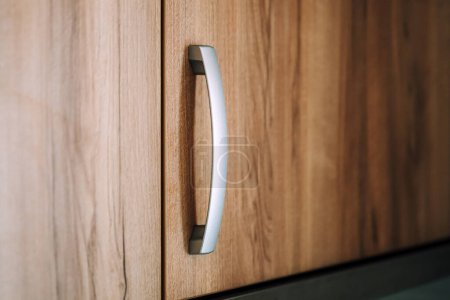 Photo for Kitchen cabinet handle, close up with selective focus - Royalty Free Image