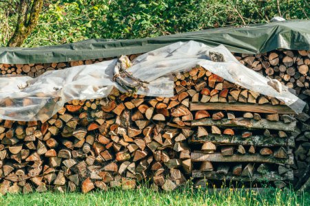 Photo for Firewood stack on farm, large pile of chopped wood, selective focus - Royalty Free Image