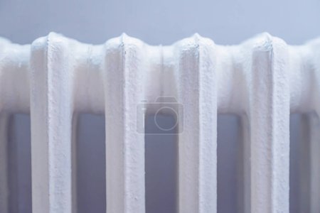 Photo for Cold radiator heater in the room, selective focus - Royalty Free Image