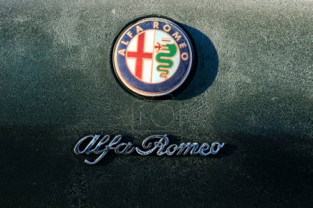 Photo for Novi Sad, Serbia - January 22, 2024: Alfa Romeo car frozen logo on rear end of the vehicle - Royalty Free Image