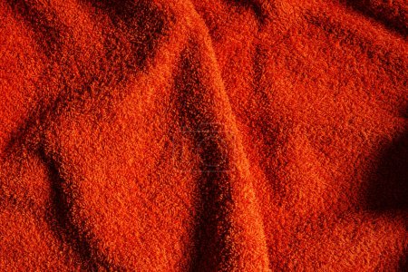 Téléchargez les photos : Texture de serviette de bain orange, vue sur le dessus - en image libre de droit