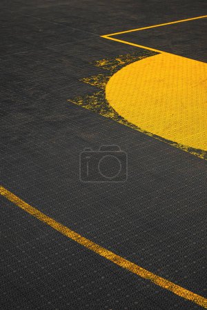 Streetball court or outdoor basketball pitch with plastic non slip surface, selective focus