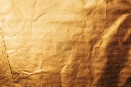 Foto de Textura de la superficie de papel de embalaje de color dorado como fondo - Imagen libre de derechos