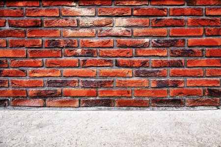 Photo for Brick wall and concrete flooring background, selective focus - Royalty Free Image