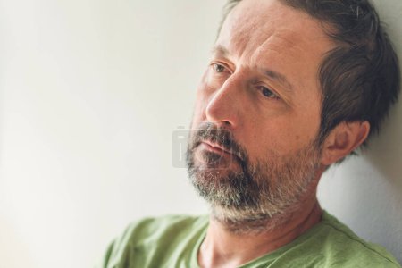 Photo for Social alienation concept, portrait of man feeling disconnected from wider society, selective focus - Royalty Free Image