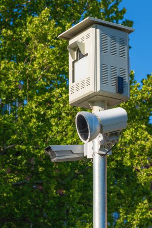Photo for Traffic speed camera on post on sunny spring day, vertical image with selective focus - Royalty Free Image