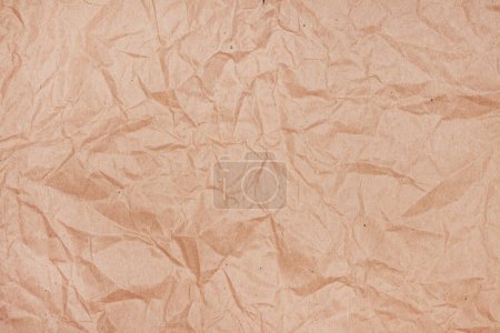 Photo for Wrinkled texture of crumpled brown craft paper as background, top view - Royalty Free Image