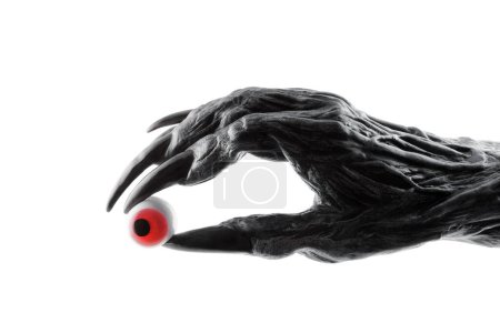 Gruselige Monsterhand mit rotem Augapfel isoliert auf weißem Hintergrund mit Clipping-Pfad
