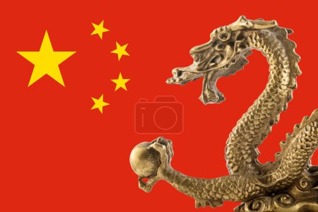 Photo for Chinese golden dragon statue on Chinese flag - Royalty Free Image