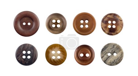 Foto de Grupo de varios botones de costura aislados sobre fondo blanco - Imagen libre de derechos