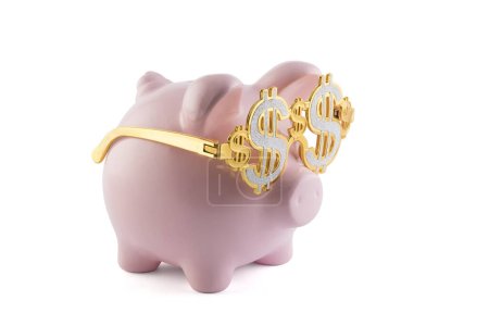 Photo for Pink piggy bank wearing golden glasses with dollar sign isolated on white background with clipping path - Royalty Free Image