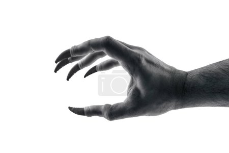 Foto de Mano monstruosa espeluznante con garras negras aisladas sobre fondo blanco con camino de recorte - Imagen libre de derechos