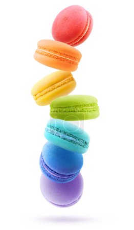 Téléchargez les photos : Macarons volants dans les airs de couleurs vives arc-en-ciel, isolés sur fond blanc - en image libre de droit