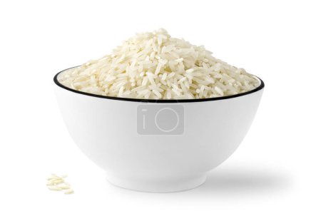 Foto de Cuenco de arroz blanco crudo aislado sobre fondo blanco - Imagen libre de derechos