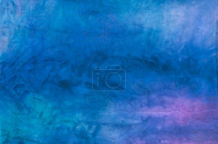 Photo for Tied dyed fabric with moody designs for background - Royalty Free Image