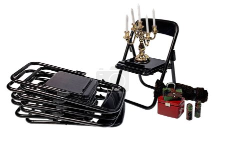 A set of Black Folding chairs and emergency supplies 