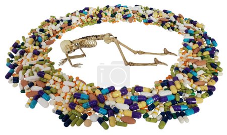 Prone Skeleton and pills showing the dangers of drug addiction
