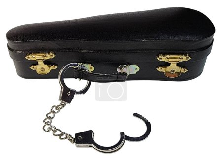 Violin case locked with handcuffs showing being locked in a contract or other musical responsibility