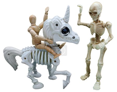 A kid riding a unicorn skeleton giving a high-five to a skeleton