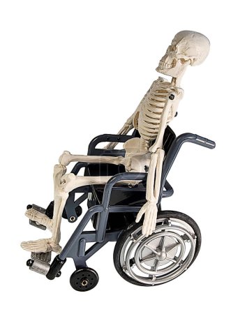 Skeleton sitting in a grey wheelchair for mobility