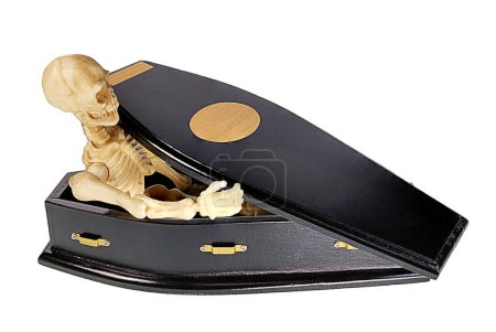 Skeleton sitting in Black Wooden Coffin Used to Bury People Who Have Passed