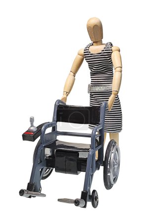 Photo for Assistant pushing an electric Wheelchair to patient - Royalty Free Image