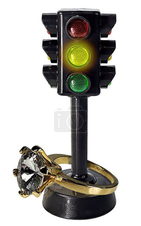 A large gold diamond ring and traffic light to show giving pause about marriage