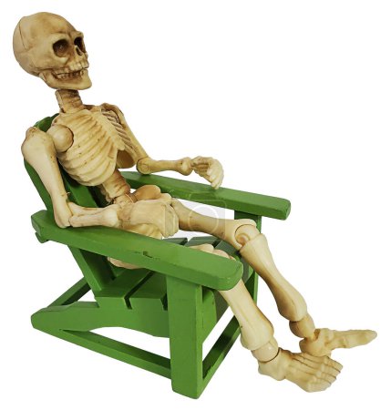 Skeleton sitting in a green deck chair