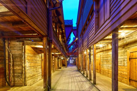 Photo for One of the narrow streets in Bryggen at dusk, Bergen, Norway - Royalty Free Image