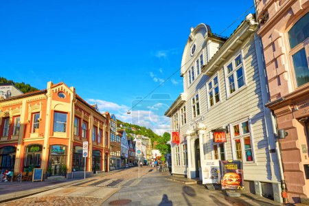 Photo for Bergen, Norway - July 04, 2023: Old street in Bergen city center with traditional houses, cafe and shops - Royalty Free Image