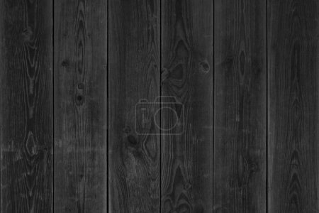 Foto de Foto en blanco y negro de la pared de madera hecha de tablones verticales - Imagen libre de derechos
