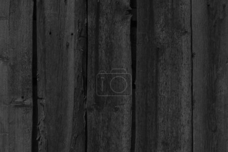Foto de Foto en blanco y negro de una antigua cerca rural de madera hecha de tablas - Imagen libre de derechos