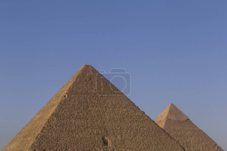 Photo for View on Great pyramid and pyramid of Khafre in Giza against clear blue sky - Royalty Free Image