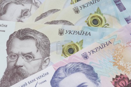 Foto de Close up of several Ukrainian hrivnya banknotes - Imagen libre de derechos