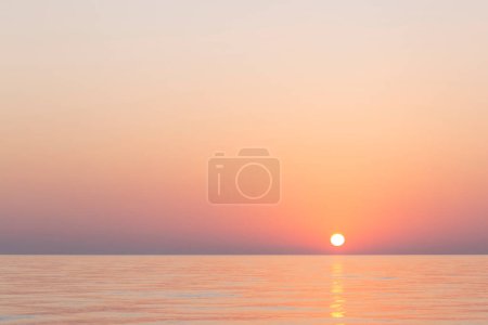 Photo for View on sun rising above Mediterranean sea at summer - Royalty Free Image