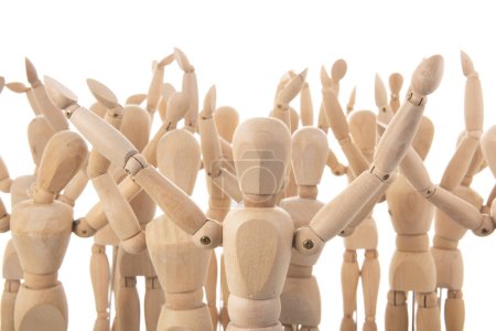 Photo for Many cheering wooden mannequins isolated over white - Royalty Free Image