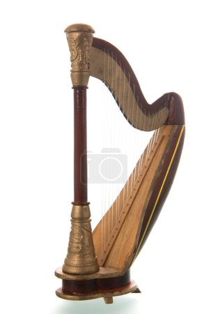 Harp music instrument isolated over white background