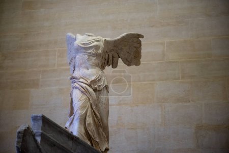 Photo for PARIS, FRANCE - Jul 30, 2022: Winged Victory of Samothrace, called Nike of Samothrace, marble sculpture in Louvre Museum - Royalty Free Image
