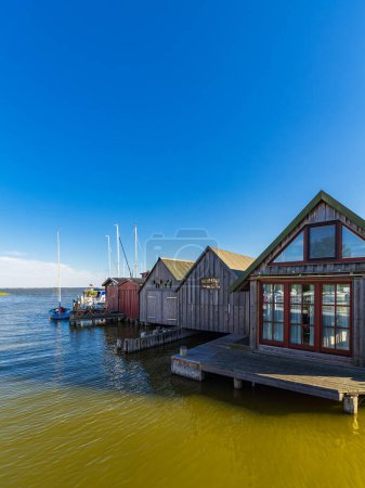 Photo for Boathouses in the port of Ahrenshoop, Germany. - Royalty Free Image