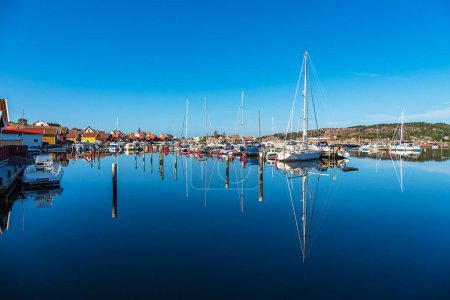 Photo for Harbor with boats in the city Fjaellbacka in Sweden. - Royalty Free Image