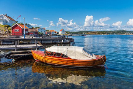 Photo for Port with boat on the archipelago island Merdo in Norway. - Royalty Free Image
