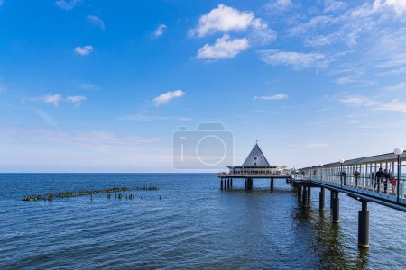 Pier and groyne on the Baltic Sea coast in Heringsdorf, Germany.