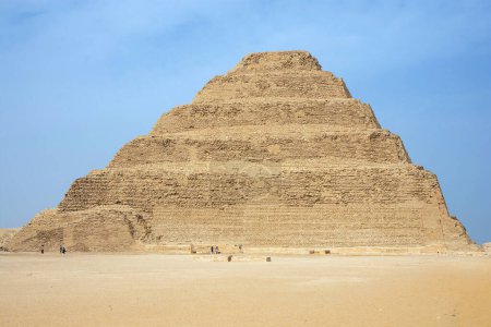 Photo for The pyramid of Djoser (or Djeser and Zoser), sometimes called the Step Pyramid of Djoser, is an archaeological site in the Saqqara necropolis, Egypt, northwest of the ruins of Memphis. - Royalty Free Image