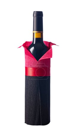 Téléchargez les photos : Bottle of red wine wrapped in crepe paper isolated on a white background. The bottle looks like a man in a red shirt. - en image libre de droit